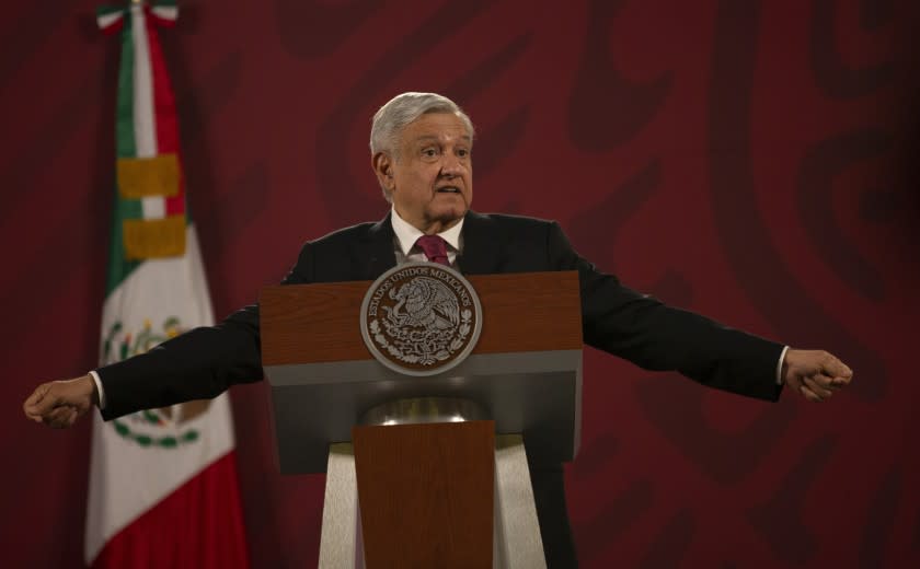 Mexico's President Andres Manuel Lopez Obrador gives his daily, morning news conference at the presidential palace, Palacio Nacional, in Mexico City, Monday, July 13, 2020. (AP Photo/Marco Ugarte)