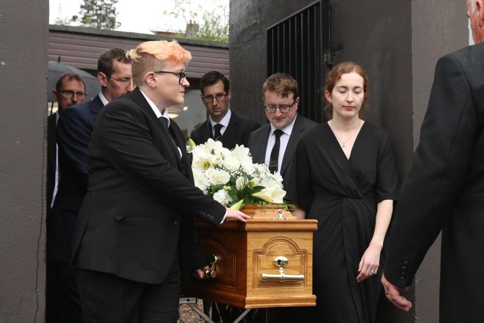 (left to right) Richard, Victoria, Nicholas and Sarah Trimble carry the coffin of their father (Liam McBurney/PA) (PA Wire)