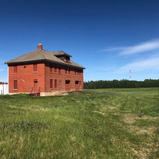 One building remains on the former site of a residential school in St. Albert once run by the United Church. The former school building, next to the Poundmakers Lodge treatment centre, was destroyed by arson in 2000. Enoch Cree Nation Chief Billy Morin said many of his band's members attended the former school before it closed in 1968. (Janet French/CBC - image credit)