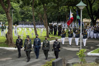 Soldiers march during the state funeral of late Philippine President Fidel Ramos at the Heroes' Cemetery in Taguig City, Philippines, Tuesday, Aug. 9, 2022. Ramos was laid to rest in a state funeral Tuesday, hailed as an ex-general, who backed then helped oust a dictatorship and became a defender of democracy and can-do reformist in his poverty-wracked Asian country. (Lisa Marie David/Pool Photo via AP)