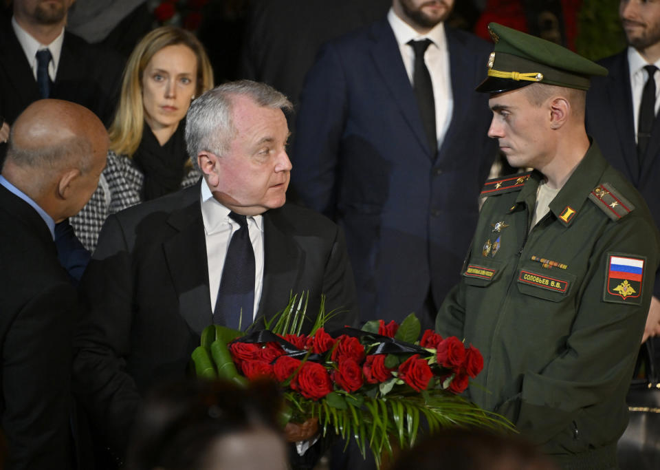 US ambassador to Russia John Joseph Sullivan, centre, walks to the coffin of former Soviet President Mikhail Gorbachev inside the Pillar Hall of the House of the Unions during a farewell ceremony in Moscow, Russia, Saturday, Sept. 3, 2022. Gorbachev, who died Tuesday at the age of 91, will be buried at Moscow's Novodevichy cemetery next to his wife, Raisa, following a farewell ceremony at the Pillar Hall of the House of the Unions, an iconic mansion near the Kremlin that has served as the venue for state funerals since Soviet times. (Alexander Nemenov/Pool Photo via AP)