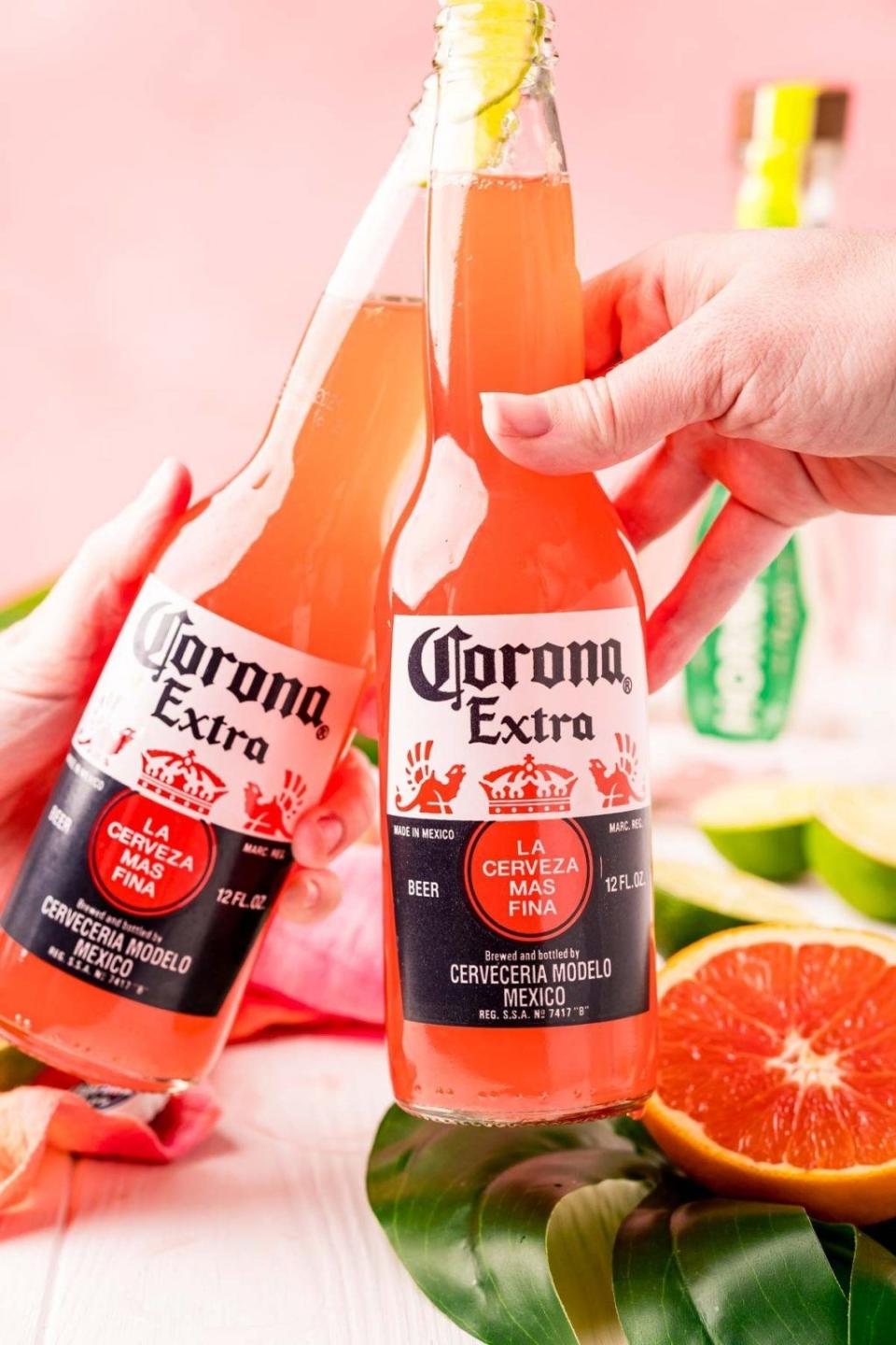 Two Corona Sunrise Drinks in Corona bottles.