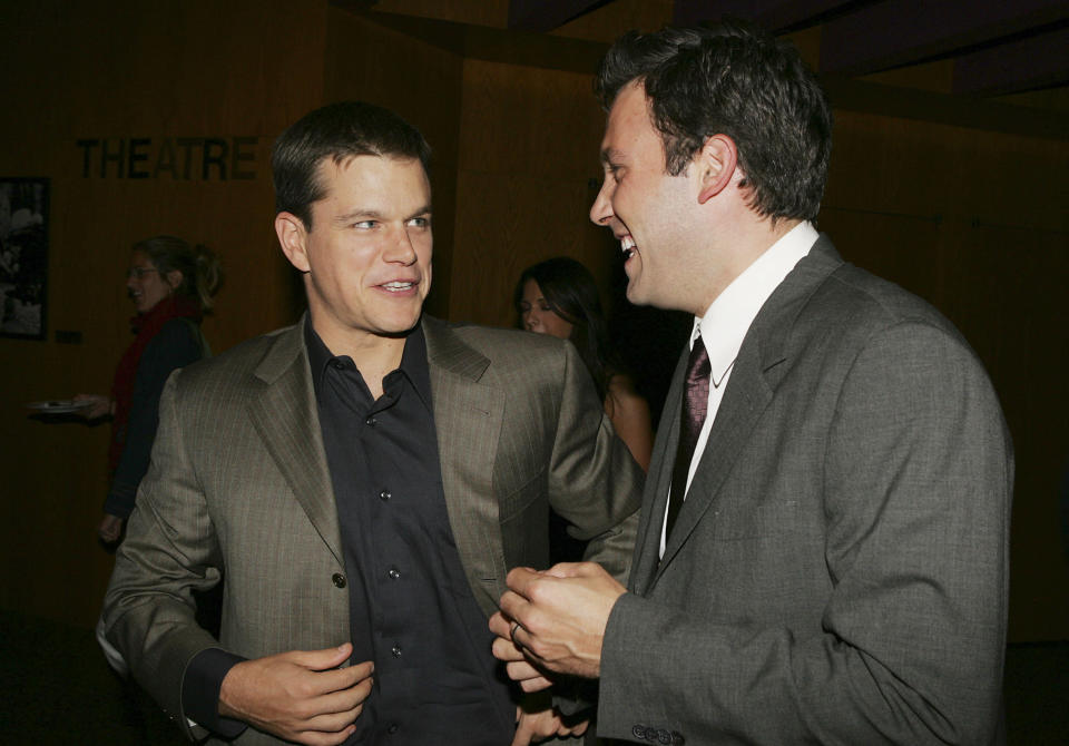 LOS ANGELES - AUGUST 8:  Actors Matt Damon (L) and Ben Affleck talk at the premiere of Dimension Film's 'The Brothers Grimm' at the Directors Guild Theater on August 8, 2005 in Los Angeles, California. (Photo by Kevin Winter/Getty Images)