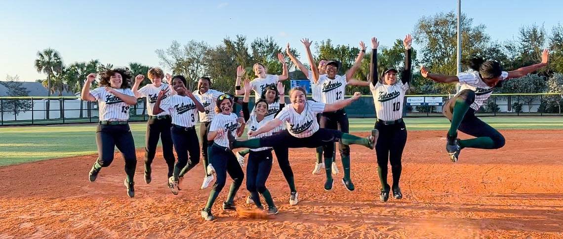 The Flanagan softball team celebrates its first victory of the season.