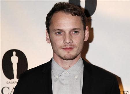 Actor Anton Yelchin poses during ceremonies for the Academy of Motion Picture Arts & Sciences Nicholl Fellowships in Screenwriting awards in Beverly Hills November 7, 2013. REUTERS/Fred Prouser