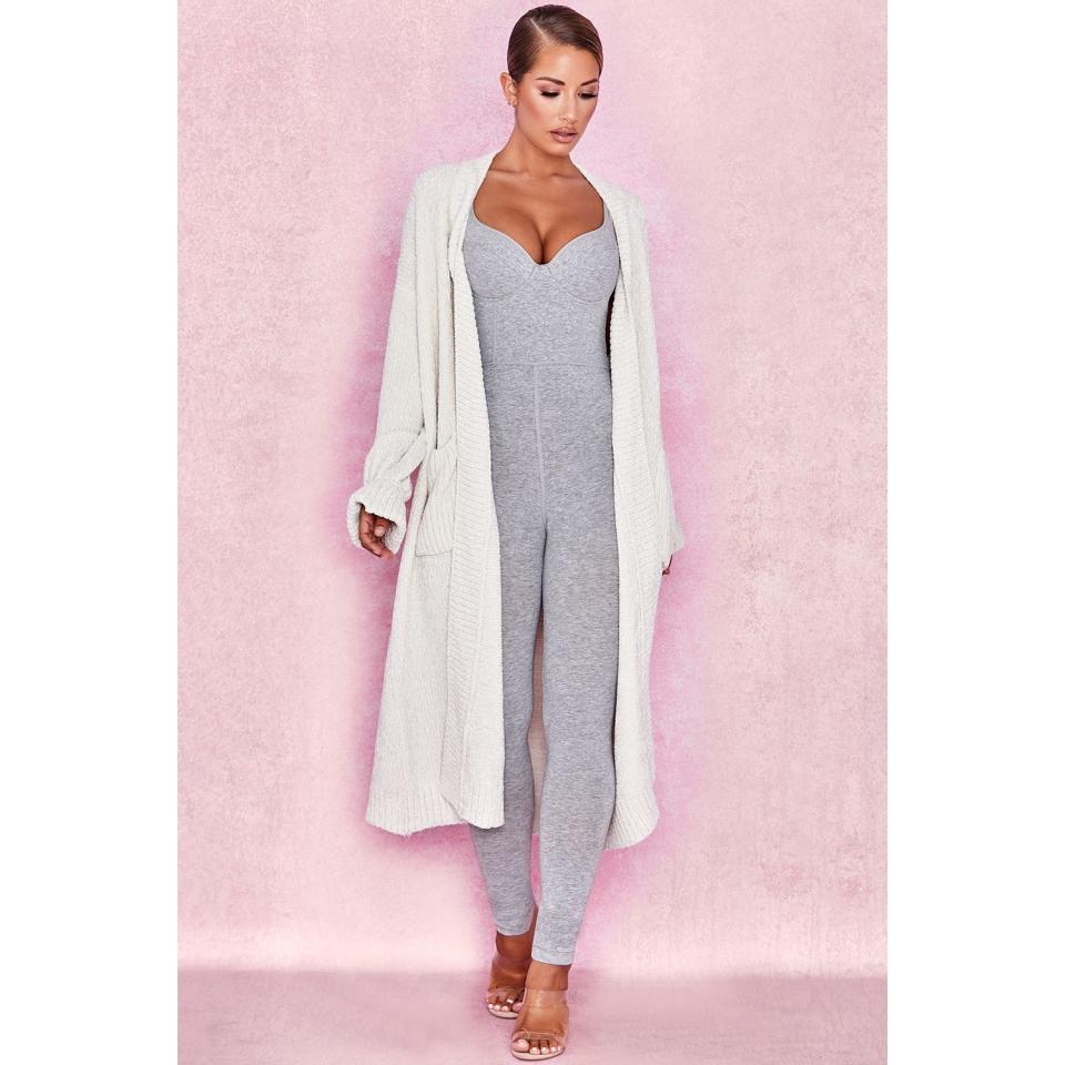 <p><a href="https://www.houseofcb.com/celine-off-white-chenille-slouchy-cardigan-us.html" rel="nofollow noopener" target="_blank" data-ylk="slk:Shop Now;elm:context_link;itc:0;sec:content-canvas" class="link ">Shop Now</a></p><p>Off White Chenille Slouchy Cardigan</p><p>houseofcb.com</p><p>$105.00</p>