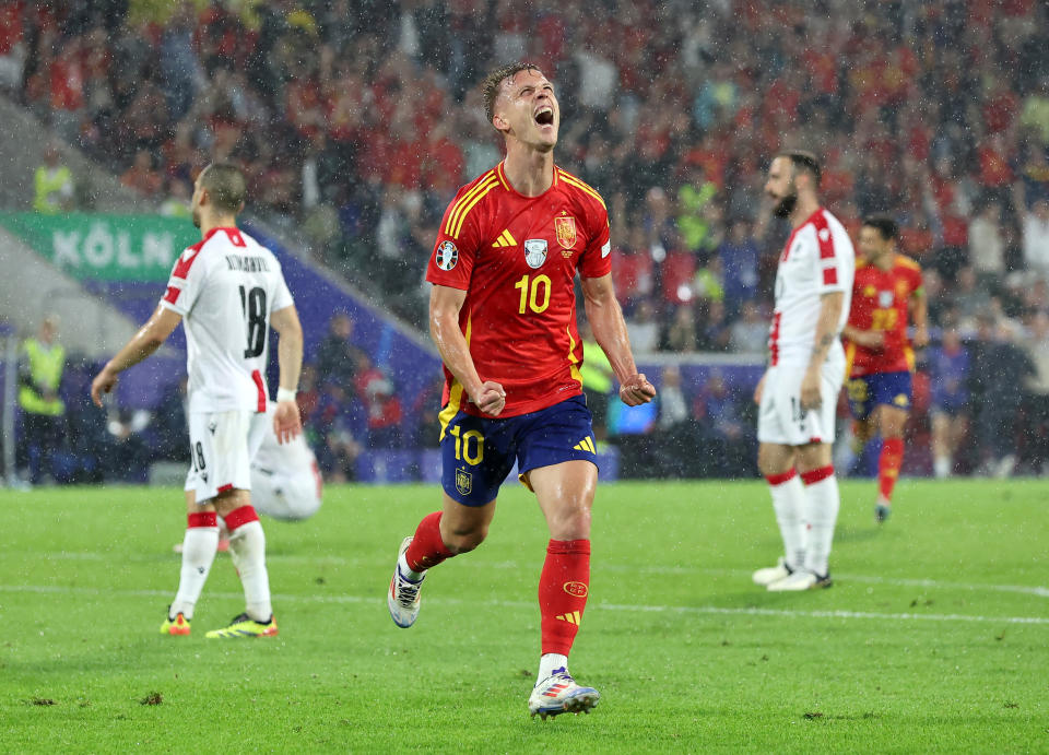 COLOGNE, GERMANY - JUNE 30: Dani Olmo of Spain celebrates scoring his team's fourth goal during the UEFA EURO 2024 round of 16 match between Spain and Georgia at Cologne Stadium on June 30, 2024 in Cologne, Germany. (Photo by Alex Grimm/Getty Images)