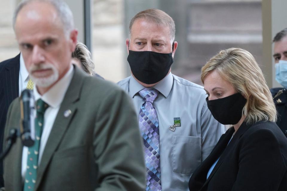 Cory and Shari Foltz, the parents of Stone Foltz, leaving court after a previous appearance (J.D.POOLEY)