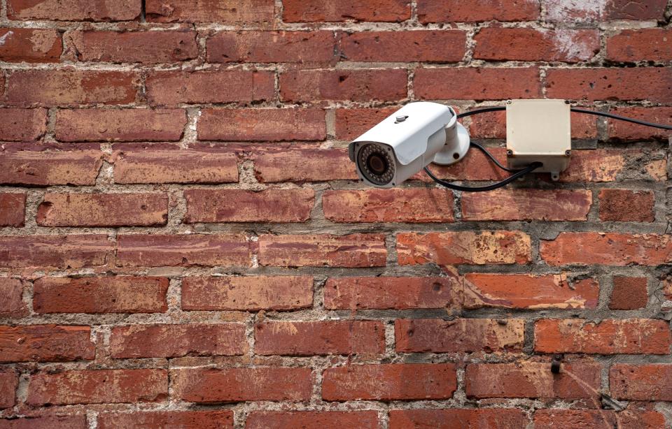 B-link cameras are a new public safety measure that connects cameras to IMPD’s Incident Analysis Center. The Bungalow Inc., in Broad Ripple, is one company that uses the cameras. This is one of the cameras in their parking lot. Photo taken Wednesday, June 28, 2023.