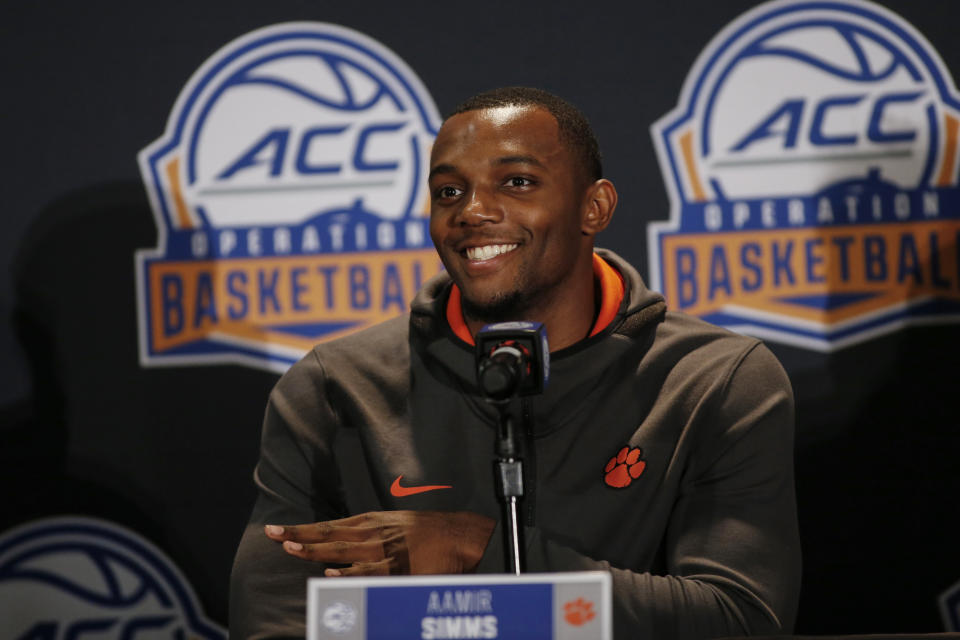 Clemson player Aamir Simms answers a question during the Atlantic Coast Conference NCAA college basketball media day in Charlotte, N.C., Tuesday, Oct. 8, 2019. (AP Photo/Nell Redmond)