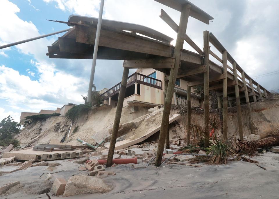 Hurricane Nicole damaged homes and dune walkover, Friday November 11, 2022 in Wilbur-by-the-Sea.