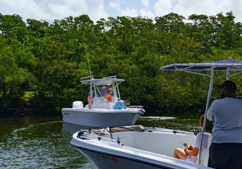 Michelle Bonell, Milton Bonell, Lucas Bonell and Samantha Windsor take their boat out for lobstering during the extra day of lobster miniseason on Sunday, July 14, 2024 at Black Point Marina in Homestead, Fla.