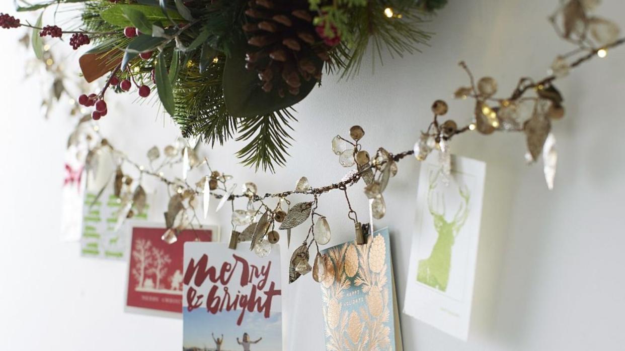  Best holiday card displays - Light Up Rustic Leaf Cardholder from Pottery Barn. 