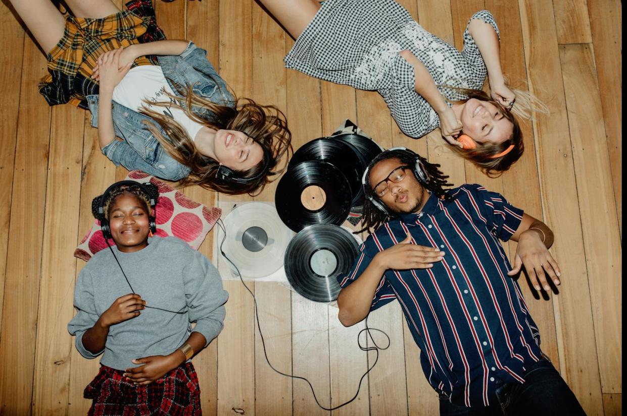 The types of music you listen to can reflect your personality traits. <a href="https://www.gettyimages.com/detail/photo/group-of-young-friends-listening-to-music-with-royalty-free-image/1156897122?phrase=listening+to+music&adppopup=true" rel="nofollow noopener" target="_blank" data-ylk="slk:Smile/Stone via Getty Images;elm:context_link;itc:0;sec:content-canvas" class="link ">Smile/Stone via Getty Images</a>