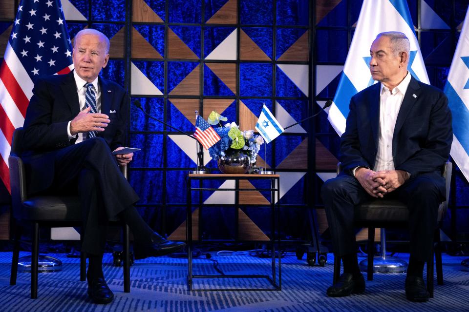 US President Joe Biden (L) speaks as Israel's Prime Minister Benjamin Netanyahu in Tel Aviv on October 18