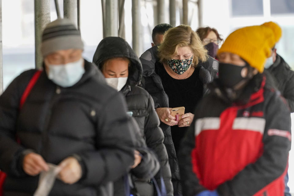 People line up for a COVID-19 vaccine outside a NYC Health Department clinic on Feb. 9, 2021, in New York. (Mary Altaffer/AP)