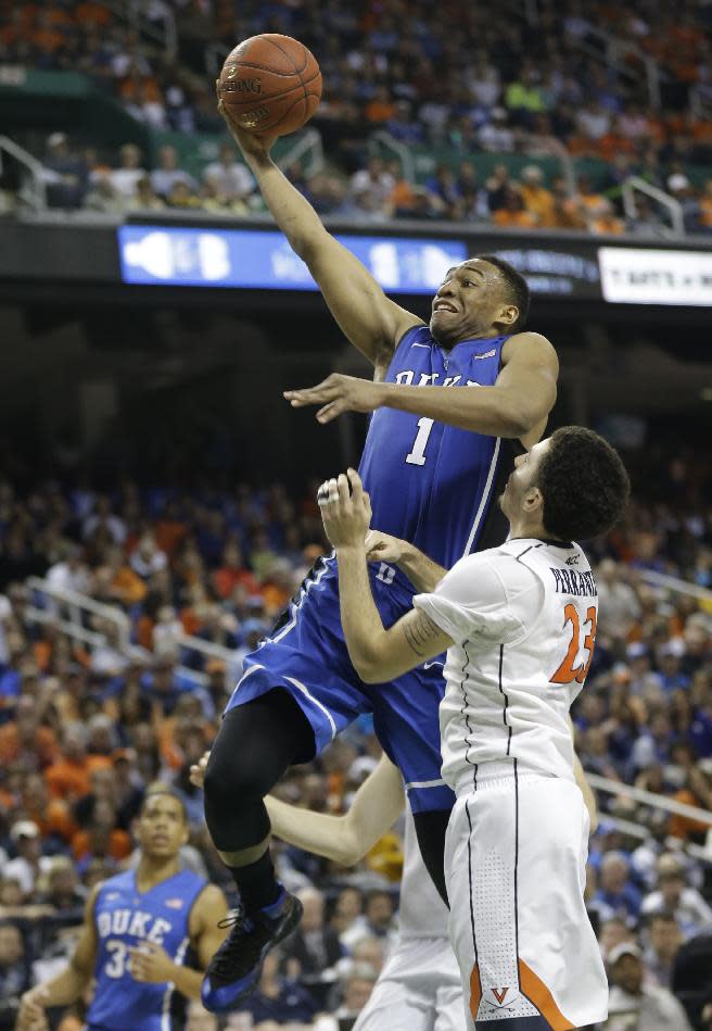 FILE - In this March 16, 2014 file photo, Duke's Jabari Parker (1) drives past Virginia's London Perrantes (23) during the second half of an NCAA college basketball game in the championship of the Atlantic Coast Conference tournament in Greensboro, N.C. Parker is entering the NBA draft, and there's a strong chance he'll be the No. 1 pick. (AP Photo/Gerry Broome, File)