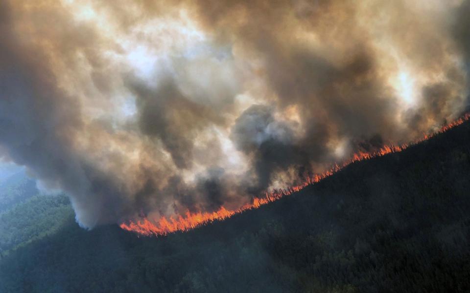 The Rainbow 2 Fire burning approximately 15 miles west of Delta Junction and west of the Tanana River near Delta Creek, Alaska