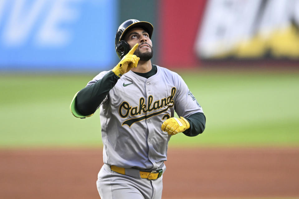 Oakland Athletics' Abraham Toro celebrates a solo home run off Cleveland Guardians starting pitcher Triston McKenzie during the first inning of a baseball game Friday, April 19, 2024, in Cleveland. (AP Photo/Nick Cammett)