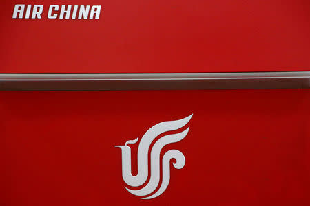 FILE PHOTO: Air China's logo is seen on a counter of Air China at a terminal of Beijing Capital International Airport in Beijing, China, March 28, 2016.REUTERS/Kim Kyung-Hoon/File Photo