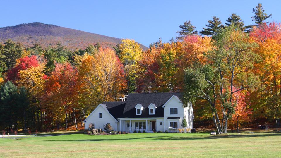 House in small town America during the fall foliage season.