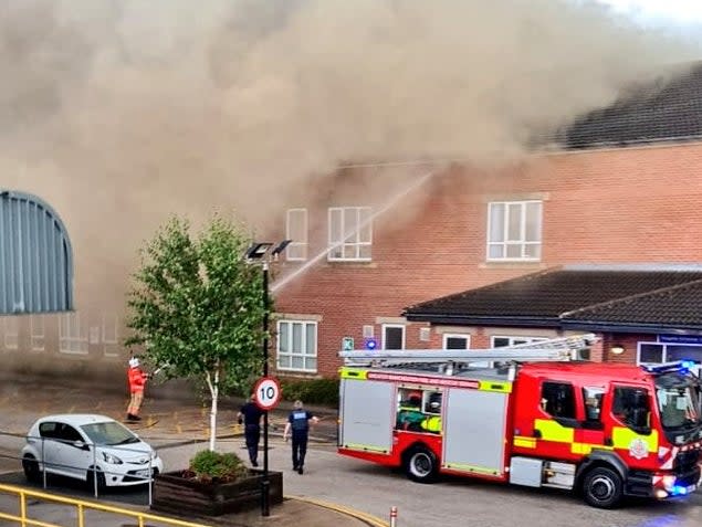 Part of the roof of Trafford General Hospital caught alight after the building was hit during an electrical storm (Name supplied)