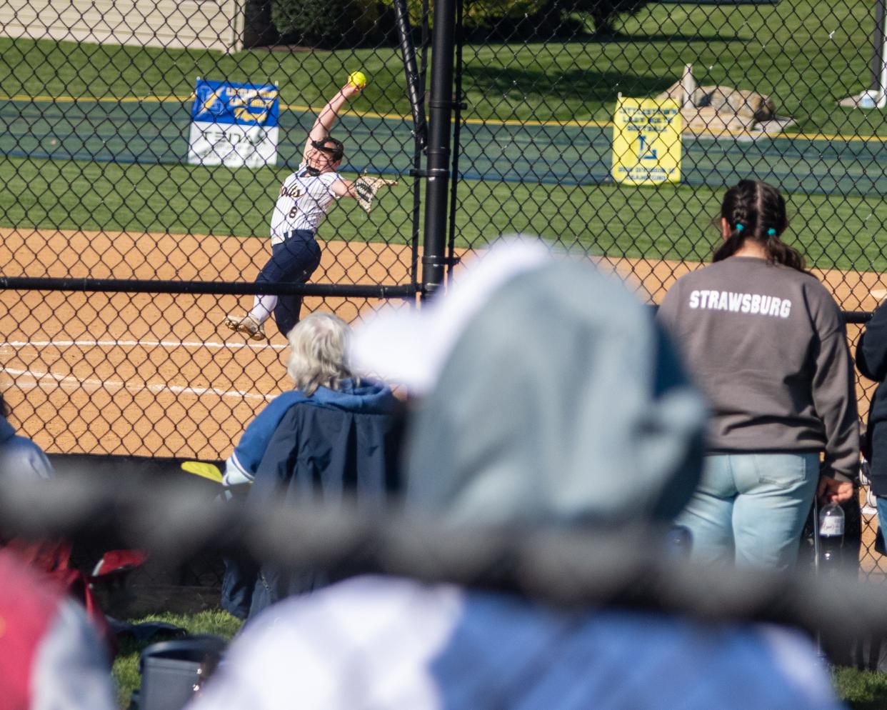 Zachary Gorsuch, foreground, watches his sister, Ashlynn, pitch against James Buchanan on Friday, April 26, 2024.