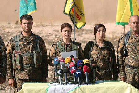 Syrian Democratic Forces (SDF) commanders attend a news conference in Ain Issa, Raqqa Governorate, Syria November 6, 2016. REUTERS/Rodi Said