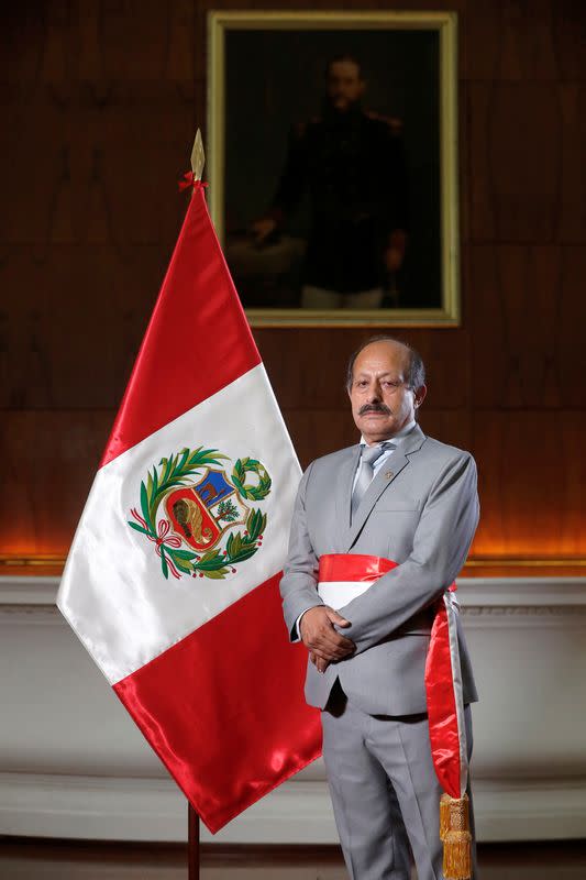 Hector Valer poses for a photograph after being named prime minister by Peru's President Pedro Castillo, in Lima