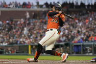 San Francisco Giants' Thairo Estrada watches his RBI double against the Chicago Cubs during the third inning of a baseball game in San Francisco, Friday, June 9, 2023. (AP Photo/Jeff Chiu)