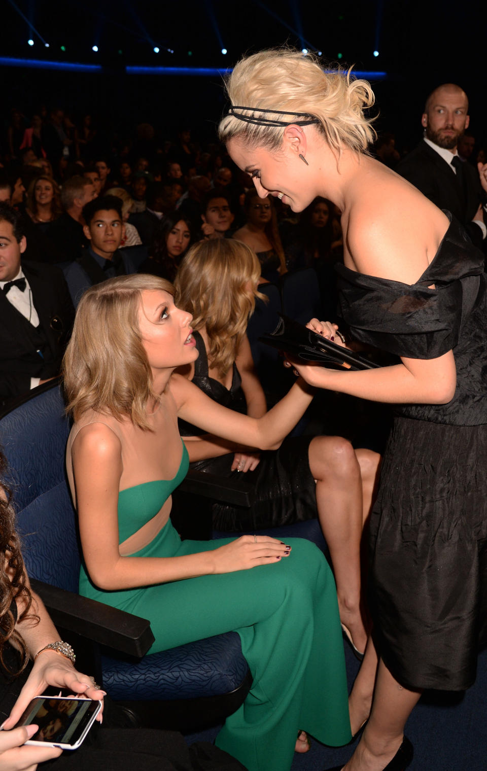 Taylor Swift speaking to Dianna Agron