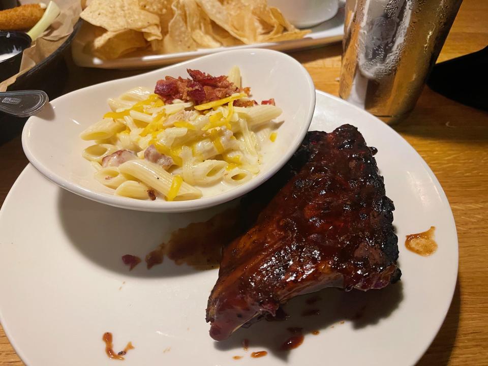 The half-rack of ribs with a side of four-cheese mac and cheese.