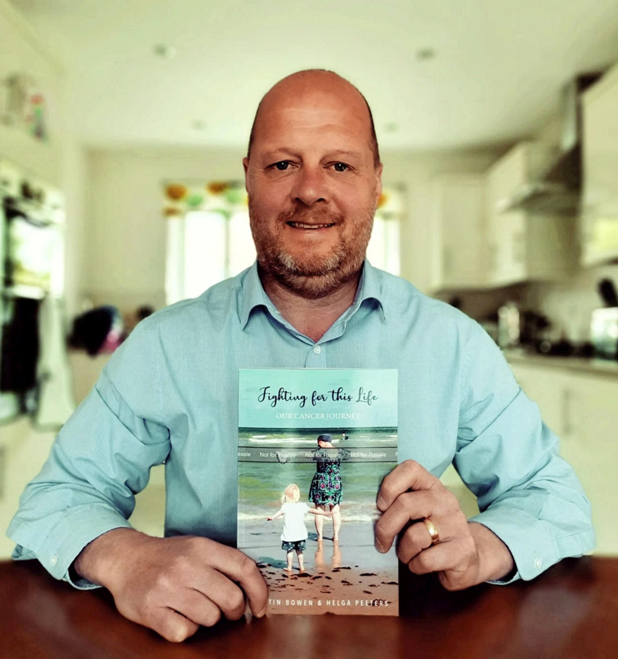 Justin Bowen spent 18 months putting together the book after his wife died from breast cancer in 2019. (SWNS)