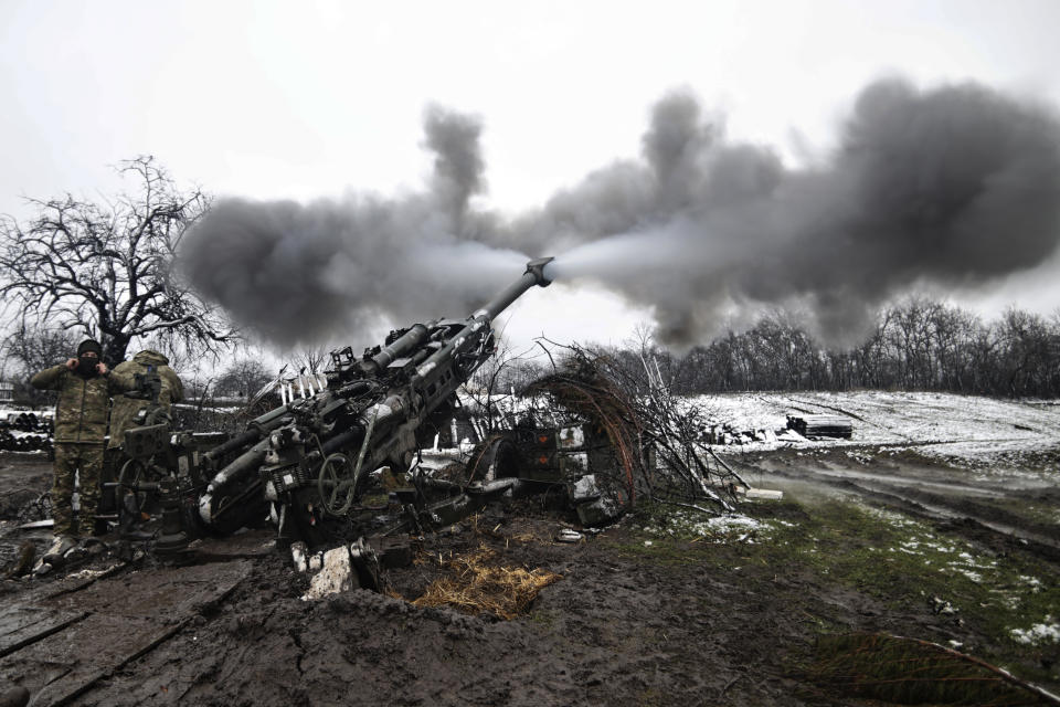 Ukrainian servicemen shoot towards Russian positions in the frontline at an undisclosed location in the Donetsk region, Ukraine, Wednesday, Nov. 23, 2022. (AP Photo/Roman Chop)