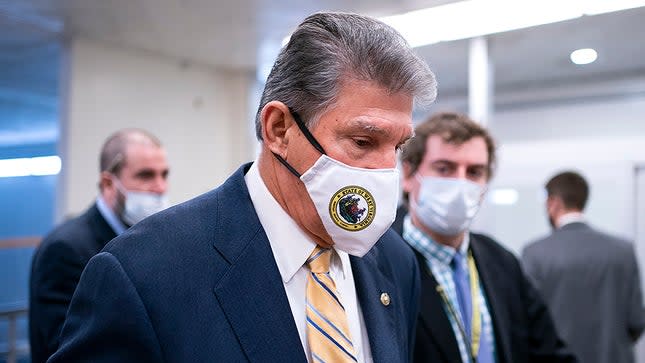 Sen. J Manchin (D-W.Va.) speaks to reporters as he arrives to the Capitol for a vote on Wednesday, November 17, 2021.