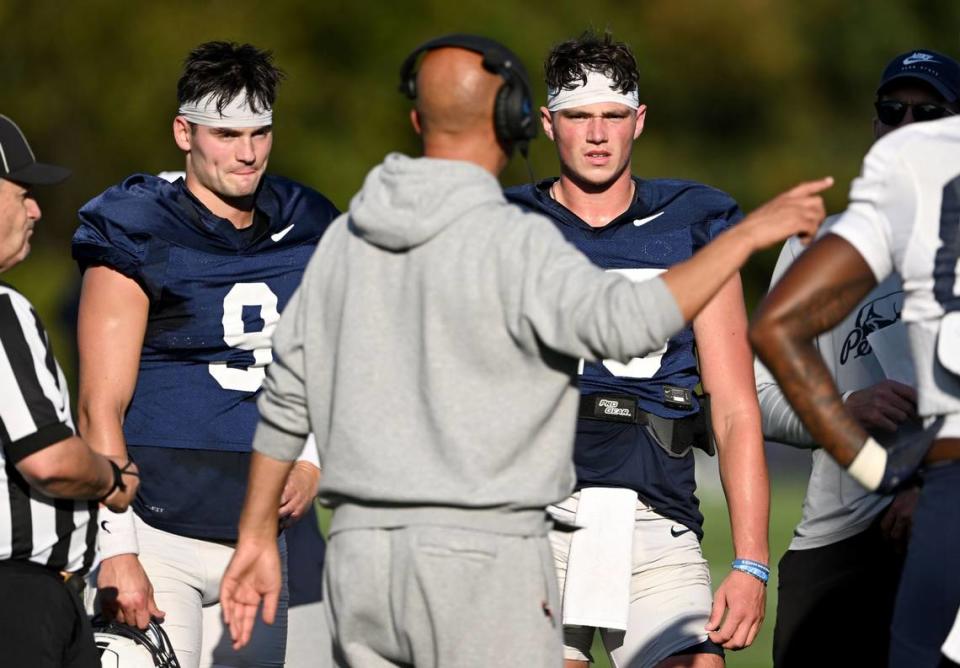 Penn State football coach James Franklin talks to quarterbacks Beau Pribula and Drew Allar during practice on Wednesday, Oct. 4, 2023.