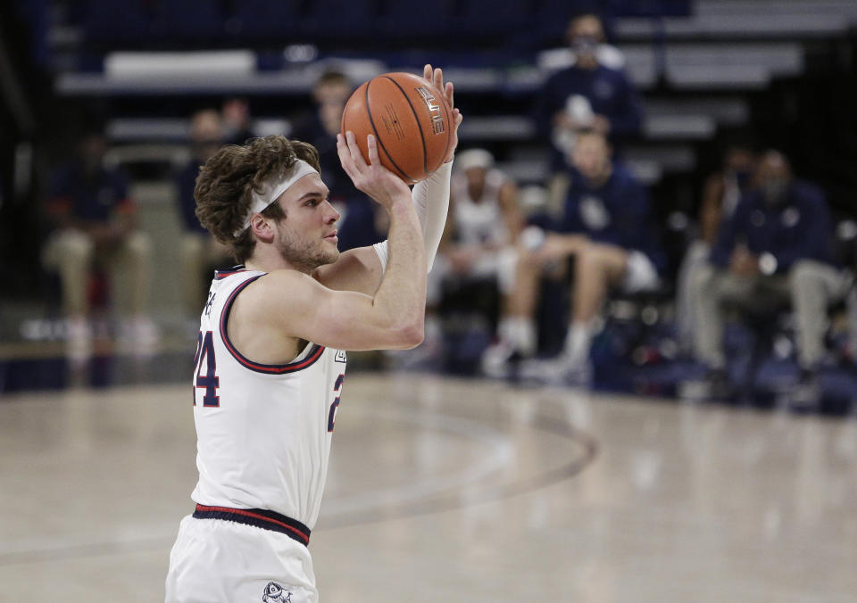 FILE - In this Feb. 27, 2021, file photo, Gonzaga forward Corey Kispert shoots during the first half of the team's NCAA college basketball game against Loyola Marymount in Spokane, Wash. Kispert's outside shooting makes him a first-round NBA draft prospect. (AP Photo/Young Kwak, File)