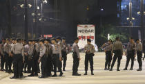 Officers stand guard near the venue of the presidential candidates debate in Jakarta, Indonesia, Sunday, Feb. 17, 2019. Indonesia is gearing up to hold its presidential election on April 17 that will pit in the incumbent against the former general.(AP Photo / Achmad Ibrahim)