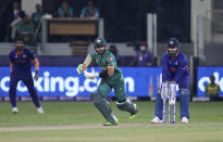 Pakistan's Mohammad Rizwan bats during the Cricket Twenty20 World Cup match between India and Pakistan in Dubai, UAE, Sunday, Oct. 24, 2021. (AP Photo/Aijaz Rahi)