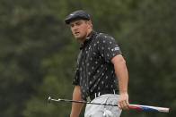 Bryson DeChambeau watches his putt on the seventh hole during the third round of the Masters golf tournament on Saturday, April 10, 2021, in Augusta, Ga. (AP Photo/Charlie Riedel)