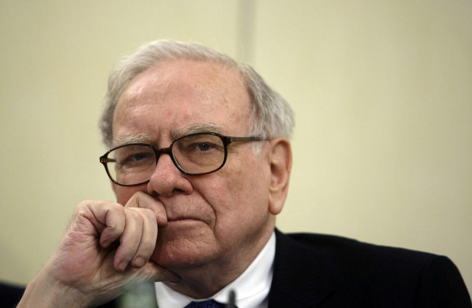 U.S. Investor Warren Buffett listens to a question during a news conference in Madrid May 21, 2008. Buffett, the world's richest man said on Wednesday that he saw the impact of the current financial crisis on the U.S. economy lasting longer than many people do. REUTERS/Andrea Comas (SPAIN) FOR BEST QUALITY IMAGE SEE: GM1E95V1AUI01