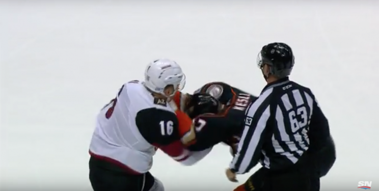 Max Domi downs Ryan Kesler with an uppercut. 