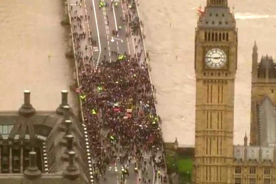 The group marches towards the Houses of Parliament and the Carriage Gates where the attack took place