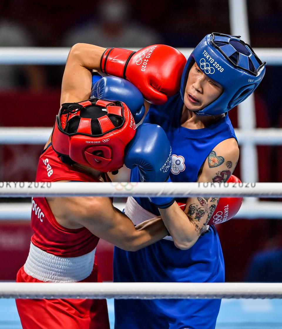 Tokyo , Japan - 1 August 2021; Hsiao-Wen Huang of Chinese Taipei, right, and Nina Radovanovic of Serbia during their women's flyweight quarter-final bout at the Kokugikan Arena during the 2020 Tokyo Summer Olympic Games in Tokyo, Japan. (Photo By Brendan Moran/Sportsfile via Getty Images)