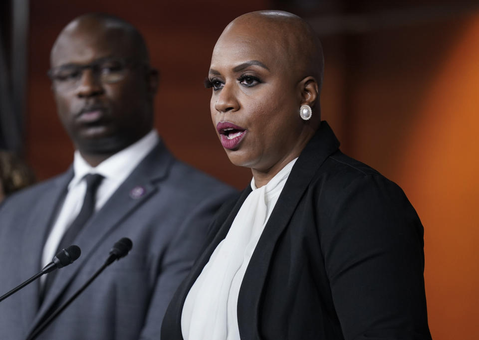 Rep. Ayanna Pressley, D-Mass., joined by Rep. Jamaal Bowman, D-N.Y., left, tells reporters she is introducing a resolution to strip Rep. Lauren Boebert, R-Colo., of her committee assignments for repeatedly making anti-Muslim remarks aimed at Rep. Ilhan Omar, D-Minn., at the Capitol in Washington, Wednesday, Dec. 8, 2021. (AP Photo/J. Scott Applewhite)