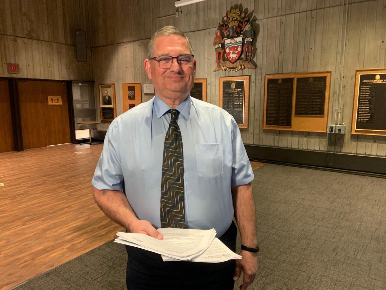 St. John's City Coun. Ron Ellsworth delivered the 2024 budget on Tuesday. (Darrell Roberts/CBC - image credit)