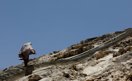 The Wider Image: "Under Siege": Fear and defiance mark life for Pakistan's Hazaras