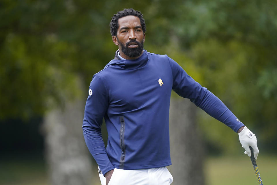 North Carolina A&T's J.R. Smith waits to putt on the 17th green during the first round of the Phoenix Invitational golf tournament in Burlington, N.C., Monday, Oct. 11, 2021. Smith, who spent 16 years in the NBA, made his college golfing debut in the tournament hosted by Elon. (AP Photo/Gerry Broome)