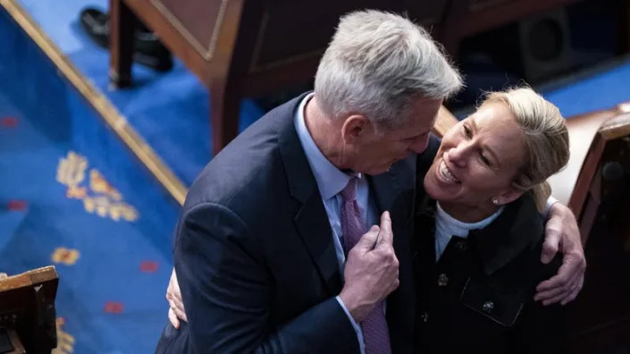 House Speaker Kevin McCarthy (R-Calif.) embraces Rep. Marjorie Taylor Greene (R-Ga.), his biggest fan, on the House Floor. 