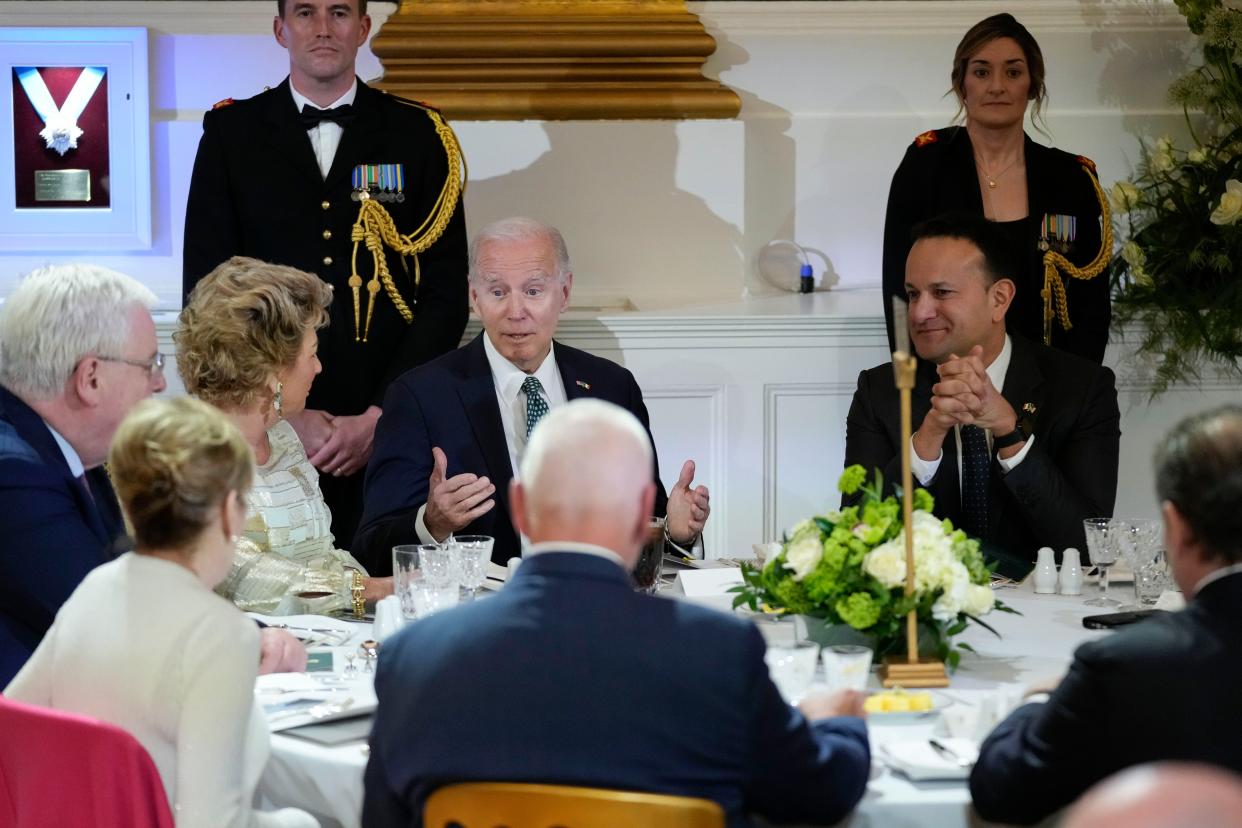 Biden sits next to Varadkar (to his right) at the Dublin Castle dinner (AP)